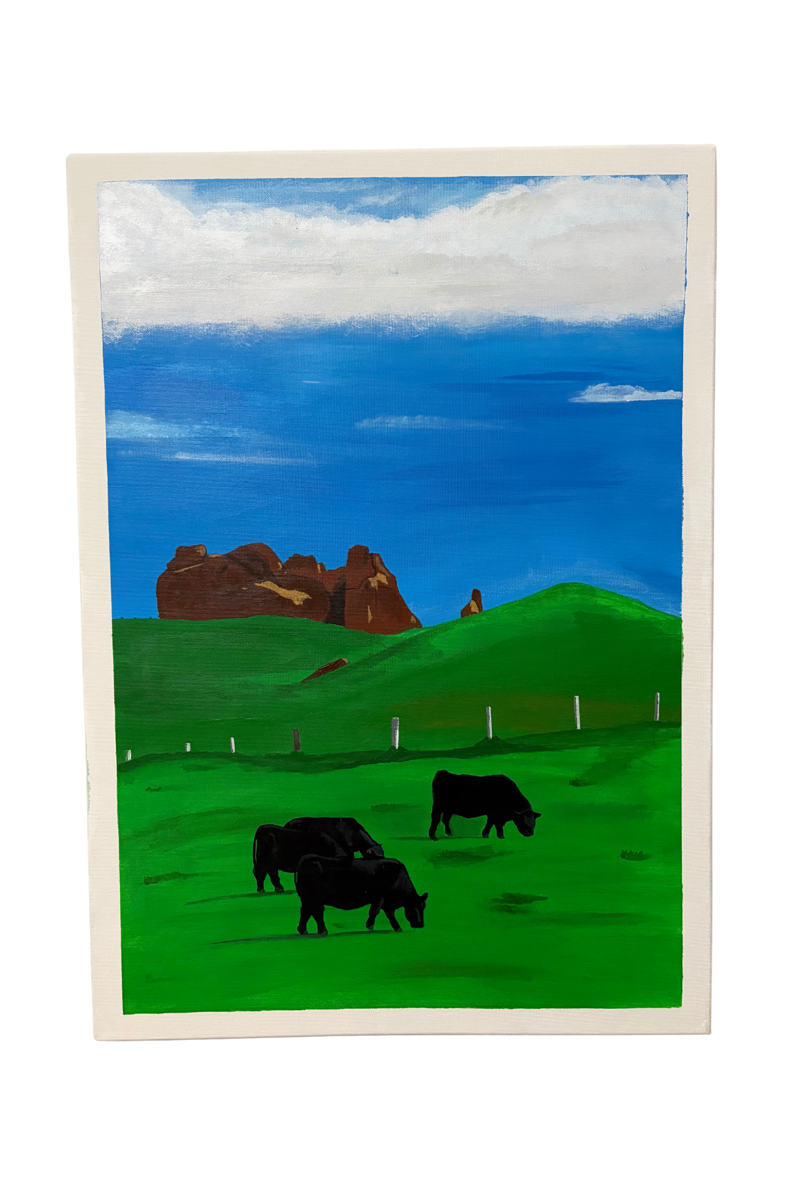 Landscape canvas artwork by Mpho Selemela depicting grazing cattle on lush green grass beneath a clear blue sky with distant rock formations.